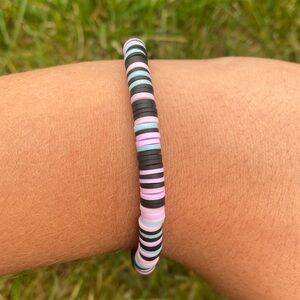 A handmade clay bead bracelet
